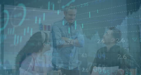 Business Team Analyzing Digital Financial Data in Office