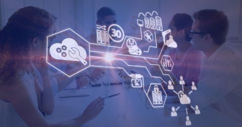 Diverse business team collaborating with digital technology interface
