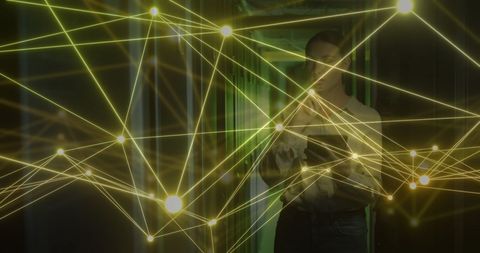 Businesswoman Analyzing Digital Network in Server Room