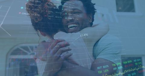 Happy Couple Embracing Against Financial Growth Graph Overlay