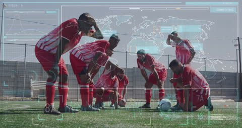 Tired Football Players Analyzing Data Overlay on Field