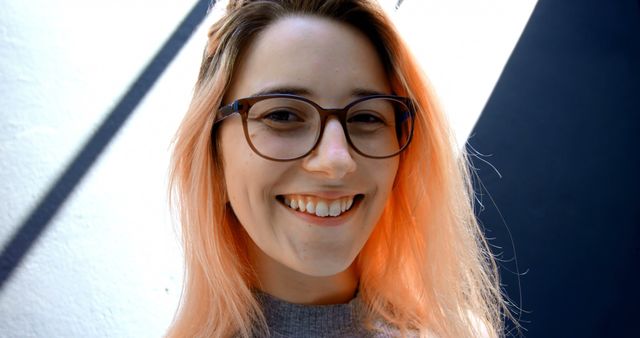 Smiling Woman with Glasses and Pink Hair in Sunlight - Download Free Stock Images Pikwizard.com