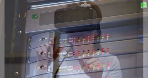 Woman in VR Headset Studies Server Room with Mixed Reality