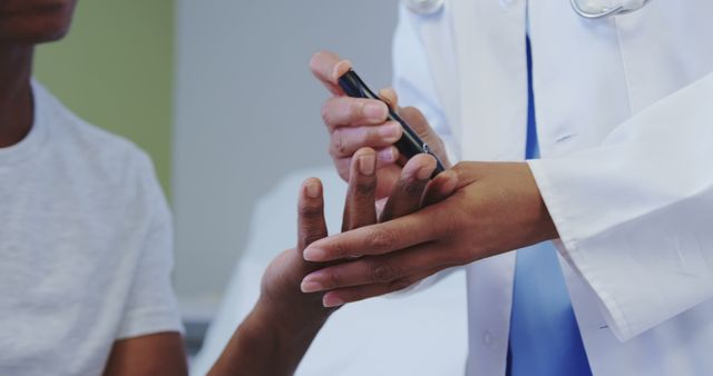 Doctor Checking Blood Sugar Level of Patient in Medical Office - Download Free Stock Images Pikwizard.com