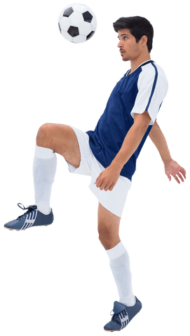 Biracial male footballer dribbling ball transparent background