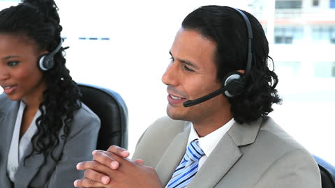 Diverse Customer Service Team Communicating with Clients