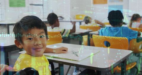 Smiling schoolboy with digital overlay in classroom