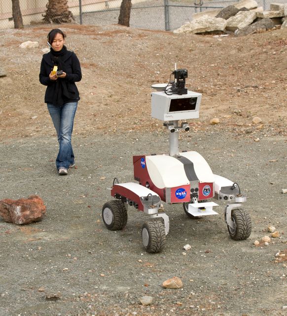 K-10 'Red' planetary rover  in the Nasa Ames Marscape: operations tests at Marscape (Ames Mars Yard) with remote operations from Ames Future Flight Centeral (FFC) Simulator with Susan Y. Lee observing.