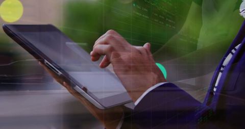 Business executive tapping tablet with financial dashboard overlay and data visualization