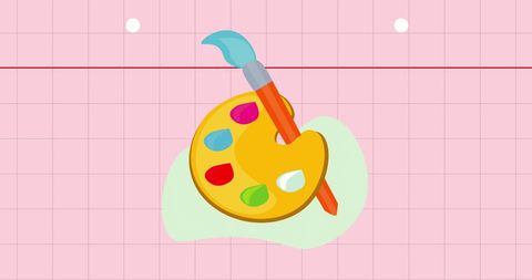 Colorful paint palette and brush on pink grid background