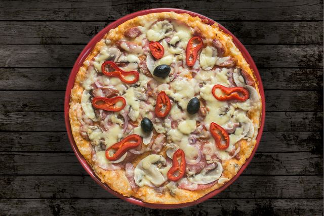 Delicious Pizza with Mushrooms, Olives, and Red Peppers on Wooden Background - Download Free Stock Photos Pikwizard.com