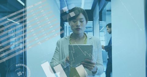 asian businesswoman analyzing digital financial data in office - Download Free Stock Images Pikwizard.com