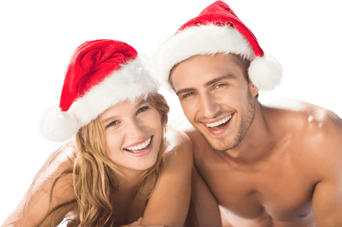 Happy couple wearing christmas hats on transparent background