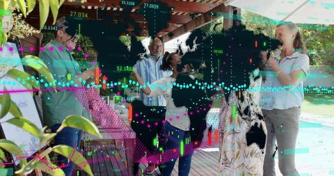 Clapping group celebrating while speaker presenting with financial market data overlay