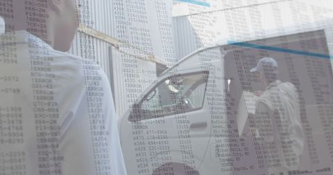 Technicians inspecting white pickup with error data overlay for industrial diagnostics