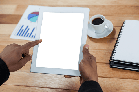 Businessperson Using Tablet at Desk with Coffee Cup Transparent Background - Download Free Stock Videos Pikwizard.com