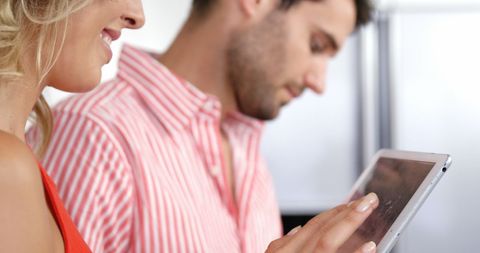 Couple Engaging with Tablet and Smartphone Modern Home - Download Free Stock Images Pikwizard.com