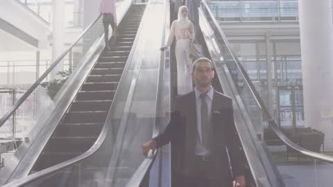 Business Professionals Riding Escalator in Corporate Environment