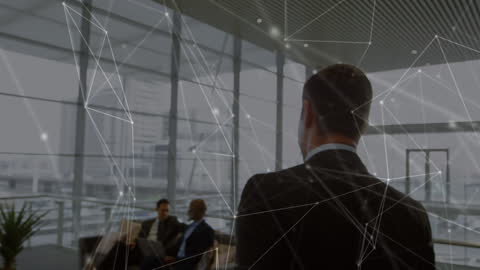 Businessman in Office with Digital Network Animation Concept