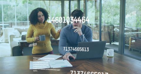 Data Processing Over Diverse Couple Working Remotely at Home - Download Free Stock Images Pikwizard.com