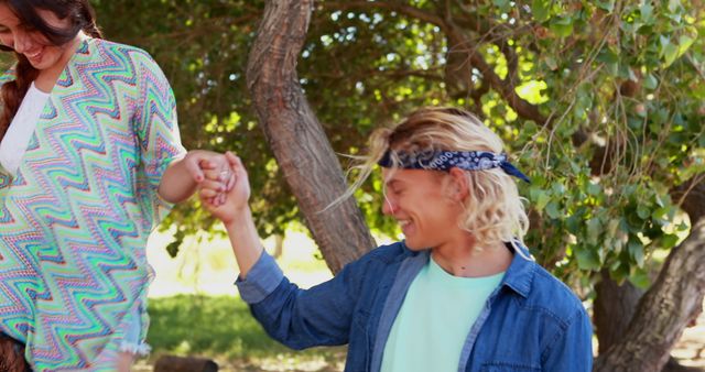 Young Friends Enjoying Outdoor Activity Holding Hands - Download Free Stock Images Pikwizard.com