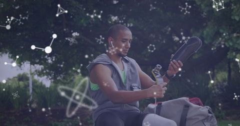 Disabled Athlete Prepares Prosthetic Blade with Digital Network Overlay Outdoors