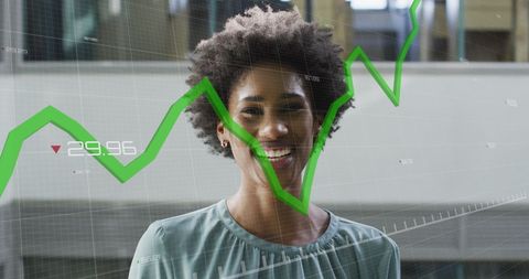 African American Businesswoman with Graph Overlay in Modern Office - Download Free Stock Images Pikwizard.com