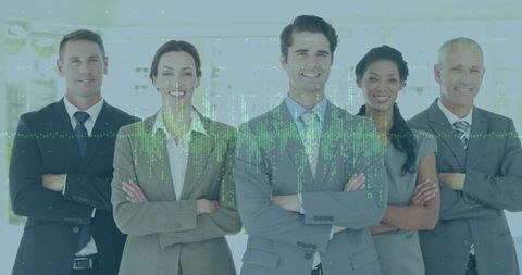 Confident executive team standing with arms crossed in modern workplace with data overlay