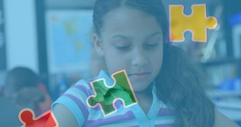 multiracial schoolgirl with puzzle pieces for autism awareness - Download Free Stock Images Pikwizard.com