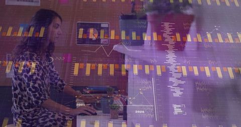 Female Data Analyst Analyzing Financial Charts in Modern Office