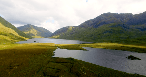 transparent lake with tranquil mountain view - Download Free Stock Videos Pikwizard.com