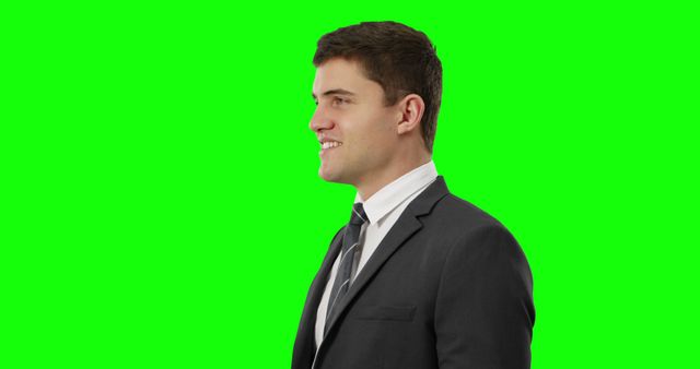 Businessman Profile View Smiling Confidently on Green Screen - Download Free Stock Images Pikwizard.com