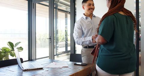 business professionals shaking hands after successful meeting - Download Free Stock Images Pikwizard.com