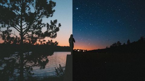 Silhouette against vibrant sunset transitioning to starry night