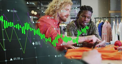 Fashion designers analyzing market trends with statistics overlay
