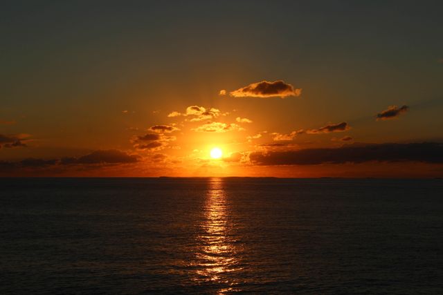 Beautiful Golden Sunrise Over Calm Ocean Waters - Download Free Stock Photos Pikwizard.com