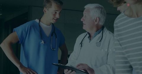 Medical Professionals Discussing Patient Care in Clinic Setting