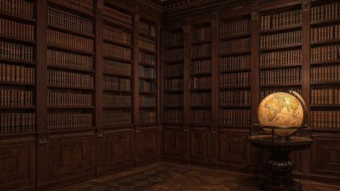 British empire antique globe in historic wood paneled library