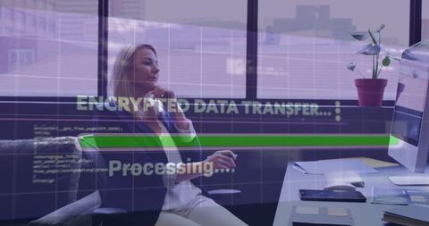 Businesswoman observing encrypted data transfer on computer