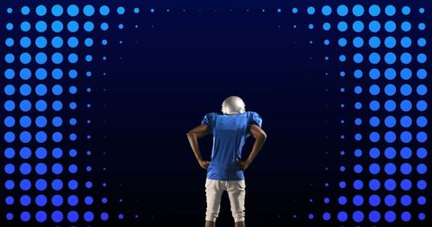 American Football Player in Spotlight with Digital Background