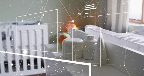 Minimalist nursery decor with toy ball and white containers