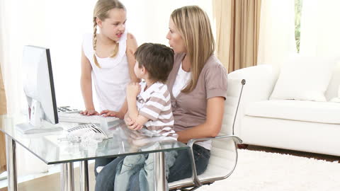 Mother and Children Engaging with Home Computer Environment