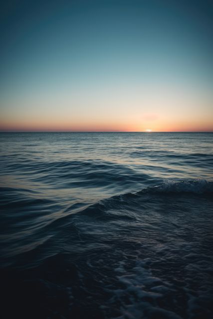 Sunset sky over ocean, created using generative ai technology - Download Free Stock Photos Pikwizard.com