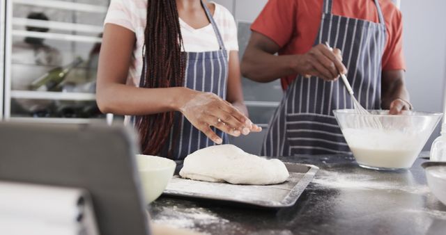 Couple Kneading Dough and Mixing Batter in Kitchen - Download Free Stock Images Pikwizard.com