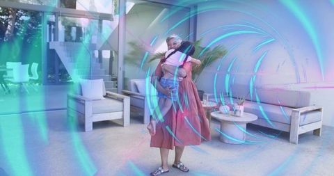 Mature Woman Holding Child in Modern Living Room Hugging with Warm Family Bond