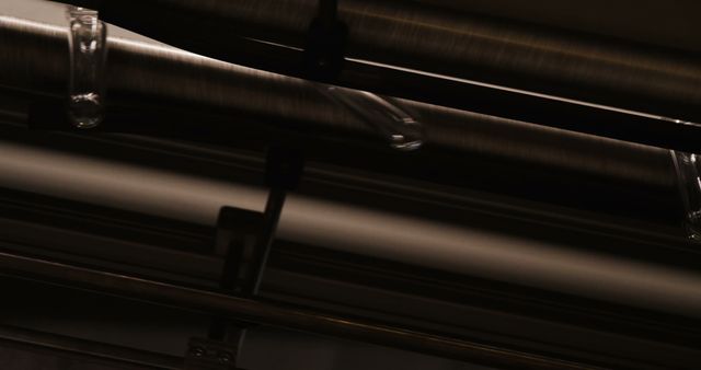 Close-up of Stainless Steel Industrial Pipelines in Dark Setting - Download Free Stock Images Pikwizard.com