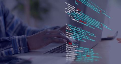 Developer Hands Typing Code on Laptop at Home Desk Wearing Blue Plaid Shirt Workspace
