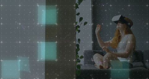 Woman interacting with virtual reality in modern home concept