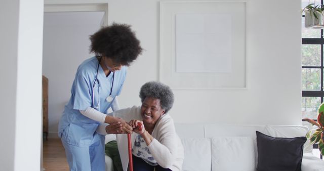 Home healthcare nurse is helping elderly woman in her living room. Ideal for illustrating concepts of in-home care, senior support, medical assistance, and nursing services. Useful for healthcare websites, senior care services, home health aide promotions, and medical blogs.