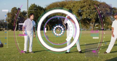 Futuristic circular hud overlaying cricket team practicing on sunlit grass field